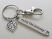 A charm keychain as a gift for a student studying to be a Occupational Therapist. The keychain has a OT heart charm, an enjoy the journey charm, and a swivel clasp. The enjoy the journey charm is about 1.75 inches long.